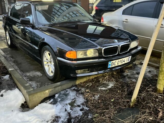 Черный БМВ 7 Серия, объемом двигателя 4.4 л и пробегом 225 тыс. км за 5700 $, фото 1 на Automoto.ua