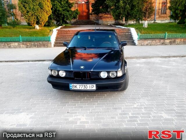 Черный БМВ 7 Серия, объемом двигателя 3 л и пробегом 410 тыс. км за 2700 $, фото 1 на Automoto.ua