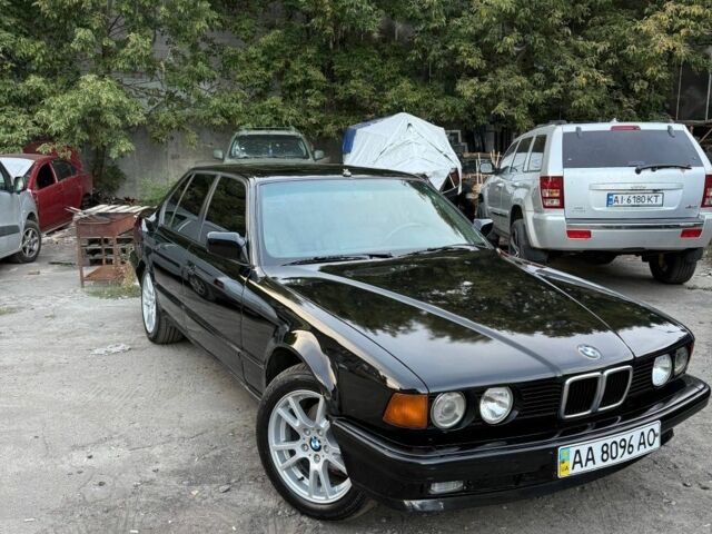 Черный БМВ 7 Серия, объемом двигателя 3.5 л и пробегом 300 тыс. км за 4800 $, фото 1 на Automoto.ua