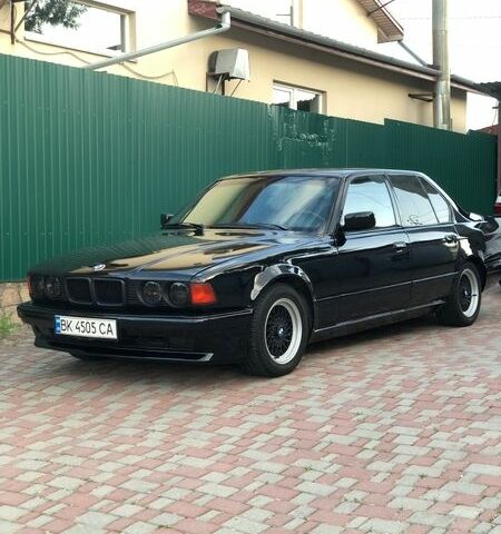 Черный БМВ 7 Серия, объемом двигателя 3 л и пробегом 420 тыс. км за 8000 $, фото 1 на Automoto.ua