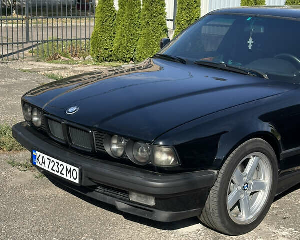 Черный БМВ 7 Серия, объемом двигателя 3 л и пробегом 450 тыс. км за 3900 $, фото 1 на Automoto.ua
