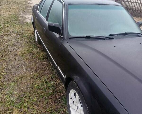 Чорний БМВ 7 Серія, об'ємом двигуна 3 л та пробігом 600 тис. км за 1550 $, фото 1 на Automoto.ua