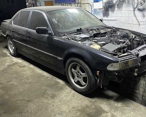 Чорний БМВ 7 Серія, об'ємом двигуна 4 л та пробігом 396 тис. км за 2000 $, фото 1 на Automoto.ua