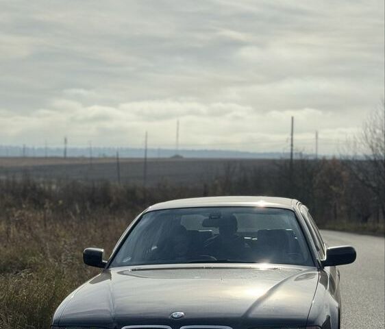 Черный БМВ 7 Серия, объемом двигателя 3 л и пробегом 480 тыс. км за 4950 $, фото 1 на Automoto.ua