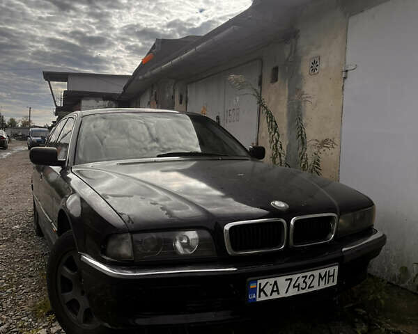 Чорний БМВ 7 Серія, об'ємом двигуна 4 л та пробігом 200 тис. км за 900 $, фото 1 на Automoto.ua
