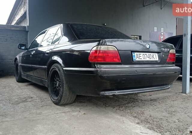Черный БМВ 7 Серия, объемом двигателя 4 л и пробегом 507 тыс. км за 2999 $, фото 1 на Automoto.ua