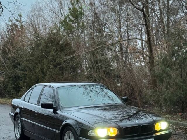 Чорний БМВ 7 Серія, об'ємом двигуна 3 л та пробігом 572 тис. км за 5200 $, фото 1 на Automoto.ua