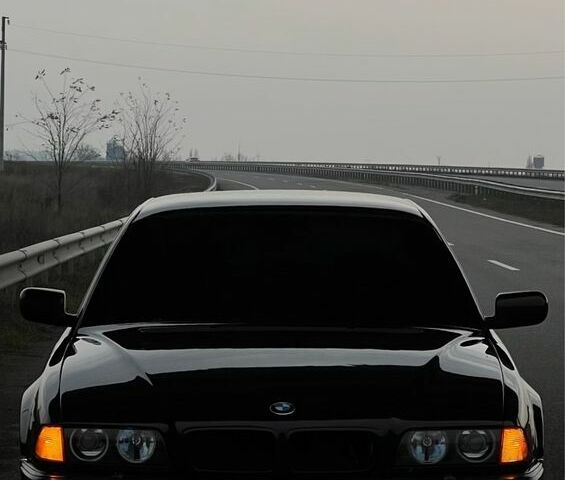 Чорний БМВ 7 Серія, об'ємом двигуна 4.4 л та пробігом 460 тис. км за 6300 $, фото 1 на Automoto.ua