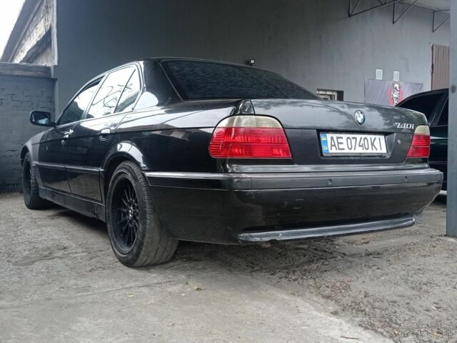 Черный БМВ 7 Серия, объемом двигателя 4 л и пробегом 510 тыс. км за 3450 $, фото 1 на Automoto.ua