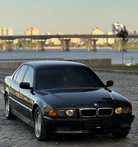 Чорний БМВ 7 Серія, об'ємом двигуна 3.5 л та пробігом 450 тис. км за 6500 $, фото 1 на Automoto.ua