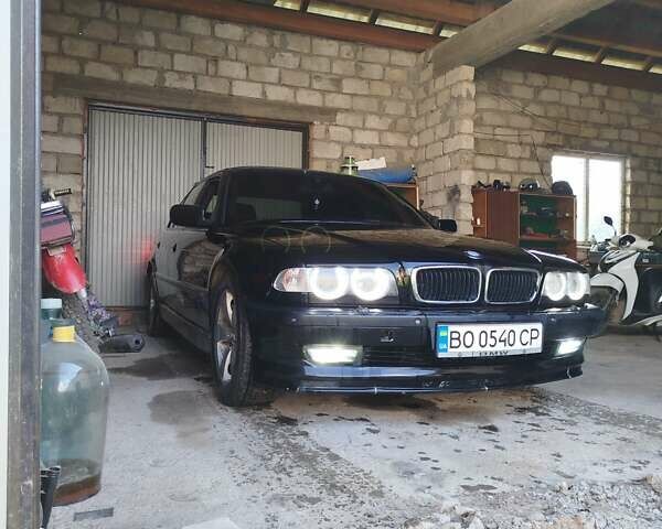 Черный БМВ 7 Серия, объемом двигателя 3 л и пробегом 300 тыс. км за 5000 $, фото 1 на Automoto.ua