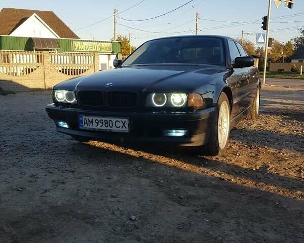 Черный БМВ 7 Серия, объемом двигателя 3.5 л и пробегом 400 тыс. км за 4200 $, фото 1 на Automoto.ua