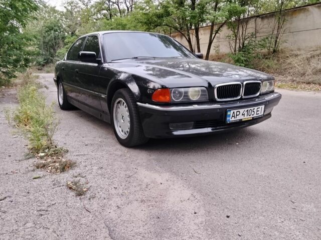 Черный БМВ 7 Серия, объемом двигателя 4 л и пробегом 486 тыс. км за 4000 $, фото 1 на Automoto.ua