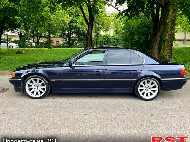 Черный БМВ 7 Серия, объемом двигателя 3 л и пробегом 350 тыс. км за 2750 $, фото 1 на Automoto.ua