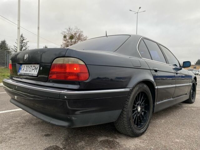 Черный БМВ 7 Серия, объемом двигателя 3.5 л и пробегом 250 тыс. км за 3300 $, фото 1 на Automoto.ua