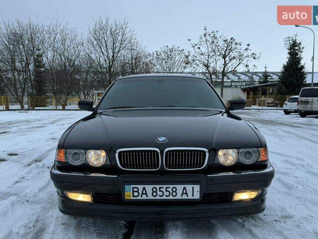 Чорний БМВ 7 Серія, об'ємом двигуна 4.4 л та пробігом 409 тис. км за 9200 $, фото 1 на Automoto.ua