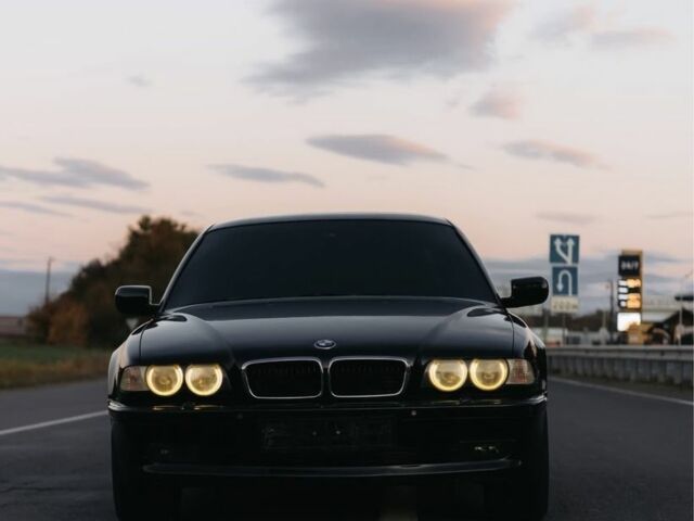 Чорний БМВ 7 Серія, об'ємом двигуна 4.4 л та пробігом 400 тис. км за 4999 $, фото 1 на Automoto.ua