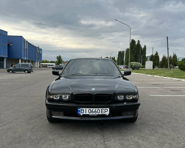 Черный БМВ 7 Серия, объемом двигателя 3.5 л и пробегом 564 тыс. км за 6700 $, фото 1 на Automoto.ua