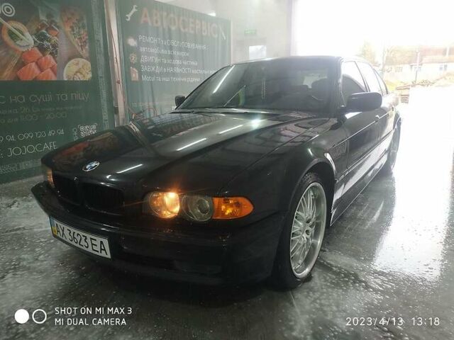 Чорний БМВ 7 Серія, об'ємом двигуна 4.4 л та пробігом 249 тис. км за 7200 $, фото 1 на Automoto.ua