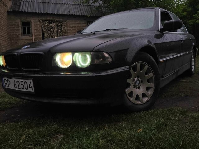 Черный БМВ 7 Серия, объемом двигателя 3 л и пробегом 600 тыс. км за 2999 $, фото 1 на Automoto.ua