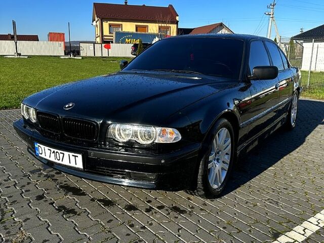 Черный БМВ 7 Серия, объемом двигателя 3.5 л и пробегом 530 тыс. км за 7700 $, фото 1 на Automoto.ua