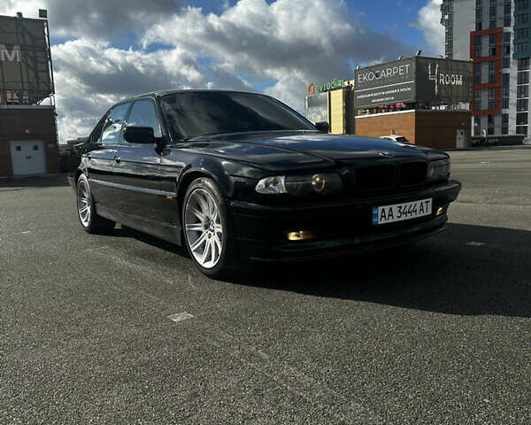 Чорний БМВ 7 Серія, об'ємом двигуна 4.4 л та пробігом 250 тис. км за 25000 $, фото 1 на Automoto.ua