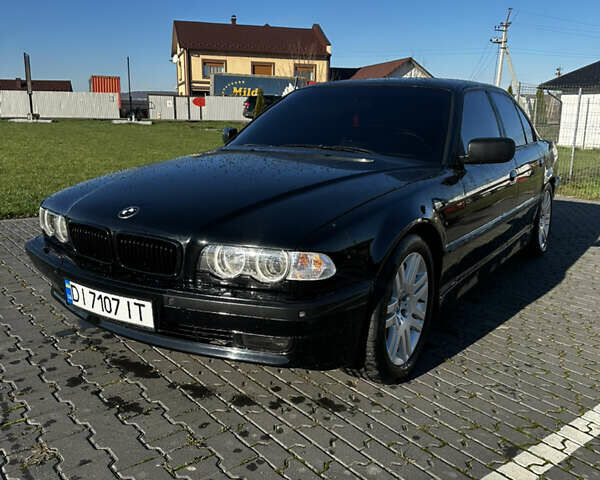 Чорний БМВ 7 Серія, об'ємом двигуна 3.5 л та пробігом 530 тис. км за 7700 $, фото 1 на Automoto.ua