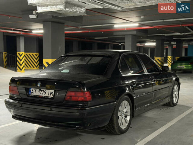 Черный БМВ 7 Серия, объемом двигателя 4.4 л и пробегом 450 тыс. км за 4500 $, фото 1 на Automoto.ua