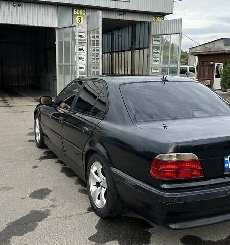 Черный БМВ 7 Серия, объемом двигателя 2.93 л и пробегом 370 тыс. км за 6500 $, фото 1 на Automoto.ua