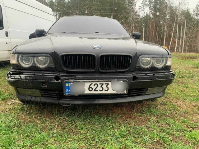 Черный БМВ 7 Серия, объемом двигателя 3.5 л и пробегом 392 тыс. км за 4000 $, фото 1 на Automoto.ua