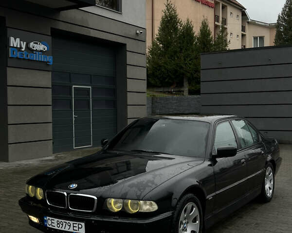 Черный БМВ 7 Серия, объемом двигателя 4.4 л и пробегом 400 тыс. км за 5499 $, фото 1 на Automoto.ua