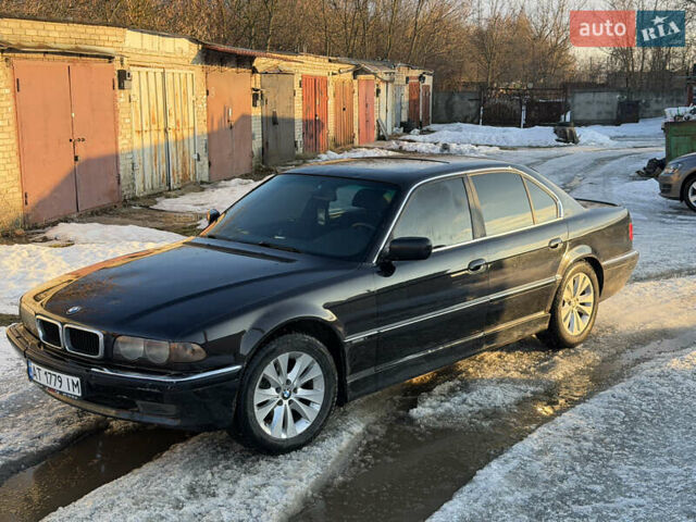 Черный БМВ 7 Серия, объемом двигателя 4.4 л и пробегом 200 тыс. км за 3900 $, фото 1 на Automoto.ua