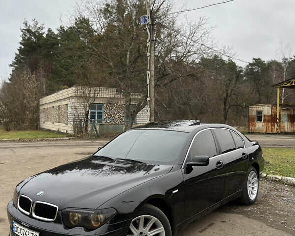 Черный БМВ 7 Серия, объемом двигателя 4.4 л и пробегом 358 тыс. км за 4599 $, фото 1 на Automoto.ua