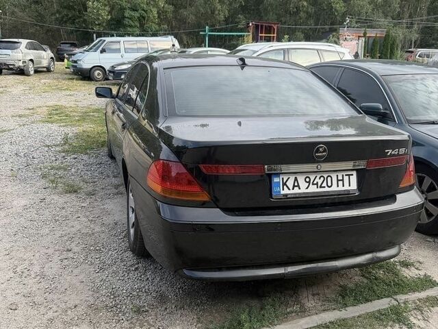 Черный БМВ 7 Серия, объемом двигателя 4.4 л и пробегом 270 тыс. км за 3700 $, фото 1 на Automoto.ua