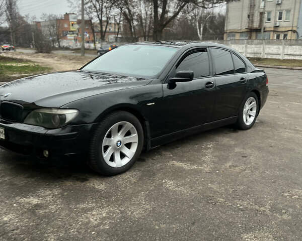 Чорний БМВ 7 Серія, об'ємом двигуна 3.5 л та пробігом 460 тис. км за 4700 $, фото 1 на Automoto.ua