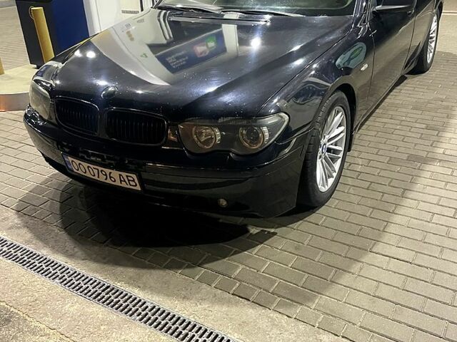 Черный БМВ 7 Серия, объемом двигателя 4.5 л и пробегом 280 тыс. км за 5000 $, фото 1 на Automoto.ua