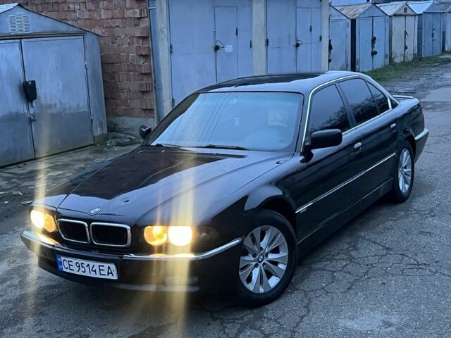 Черный БМВ 7 Серия, объемом двигателя 4.4 л и пробегом 300 тыс. км за 3650 $, фото 1 на Automoto.ua