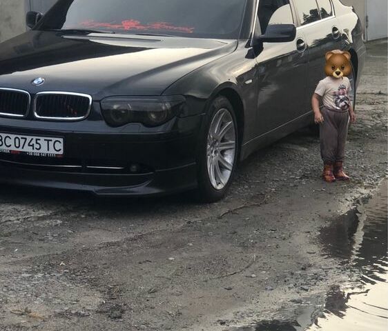 Черный БМВ 7 Серия, объемом двигателя 4.4 л и пробегом 356 тыс. км за 5199 $, фото 1 на Automoto.ua