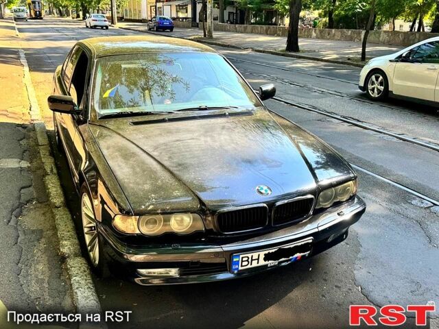 Чорний БМВ 7 Серія, об'ємом двигуна 4.4 л та пробігом 400 тис. км за 8300 $, фото 1 на Automoto.ua