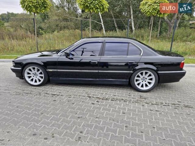 Черный БМВ 7 Серия, объемом двигателя 3.5 л и пробегом 320 тыс. км за 6300 $, фото 1 на Automoto.ua
