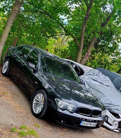 Чорний БМВ 7 Серія, об'ємом двигуна 4.5 л та пробігом 0 тис. км за 3500 $, фото 1 на Automoto.ua