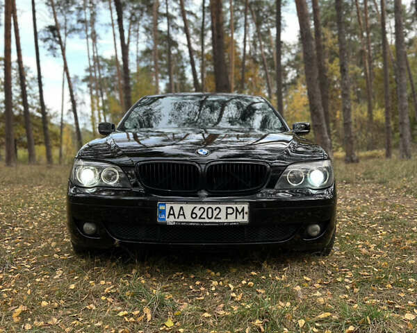 Черный БМВ 7 Серия, объемом двигателя 3.5 л и пробегом 460 тыс. км за 5300 $, фото 1 на Automoto.ua