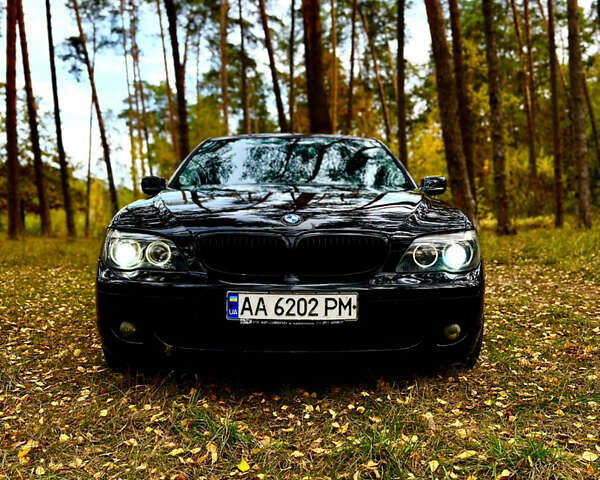 Черный БМВ 7 Серия, объемом двигателя 3.5 л и пробегом 460 тыс. км за 5200 $, фото 1 на Automoto.ua