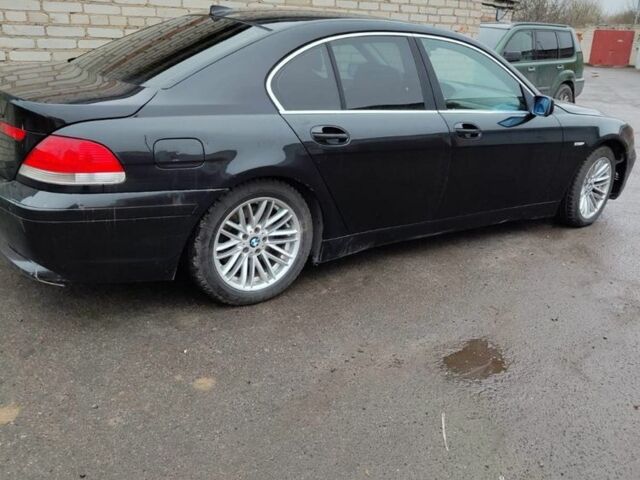 Черный БМВ 7 Серия, объемом двигателя 4.4 л и пробегом 200 тыс. км за 3500 $, фото 1 на Automoto.ua