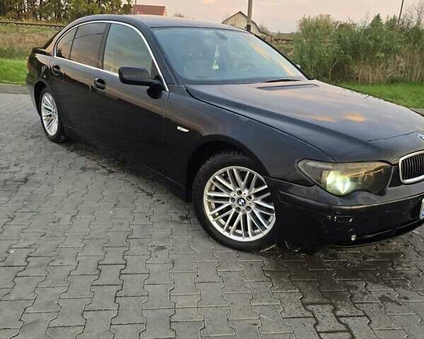 Чорний БМВ 7 Серія, об'ємом двигуна 4.4 л та пробігом 300 тис. км за 2999 $, фото 1 на Automoto.ua