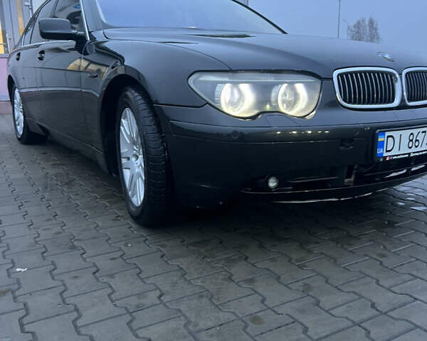 Черный БМВ 7 Серия, объемом двигателя 3.6 л и пробегом 380 тыс. км за 7000 $, фото 1 на Automoto.ua