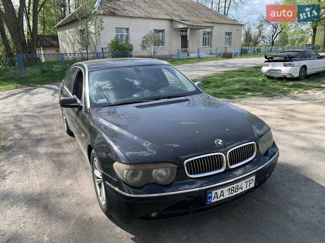Черный БМВ 7 Серия, объемом двигателя 3.6 л и пробегом 400 тыс. км за 3400 $, фото 1 на Automoto.ua