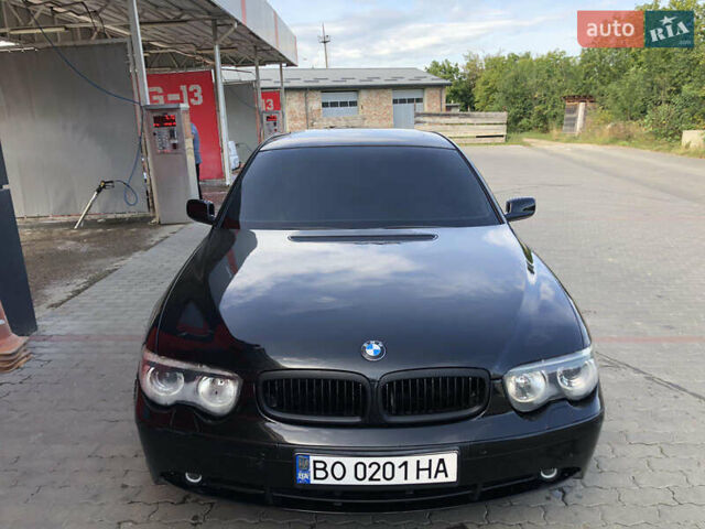 Черный БМВ 7 Серия, объемом двигателя 4.4 л и пробегом 465 тыс. км за 4450 $, фото 1 на Automoto.ua