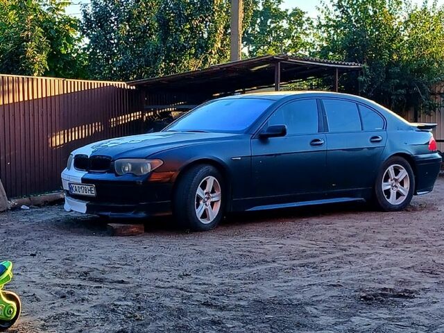 Черный БМВ 7 Серия, объемом двигателя 4.4 л и пробегом 0 тыс. км за 3000 $, фото 1 на Automoto.ua