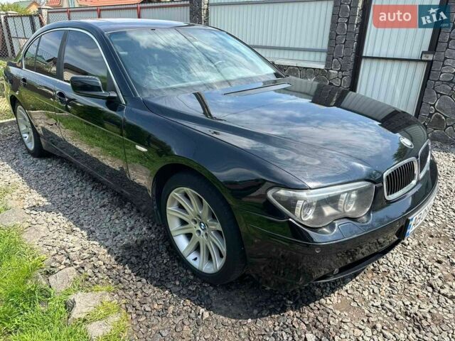 Чорний БМВ 7 Серія, об'ємом двигуна 4.4 л та пробігом 421 тис. км за 6500 $, фото 1 на Automoto.ua
